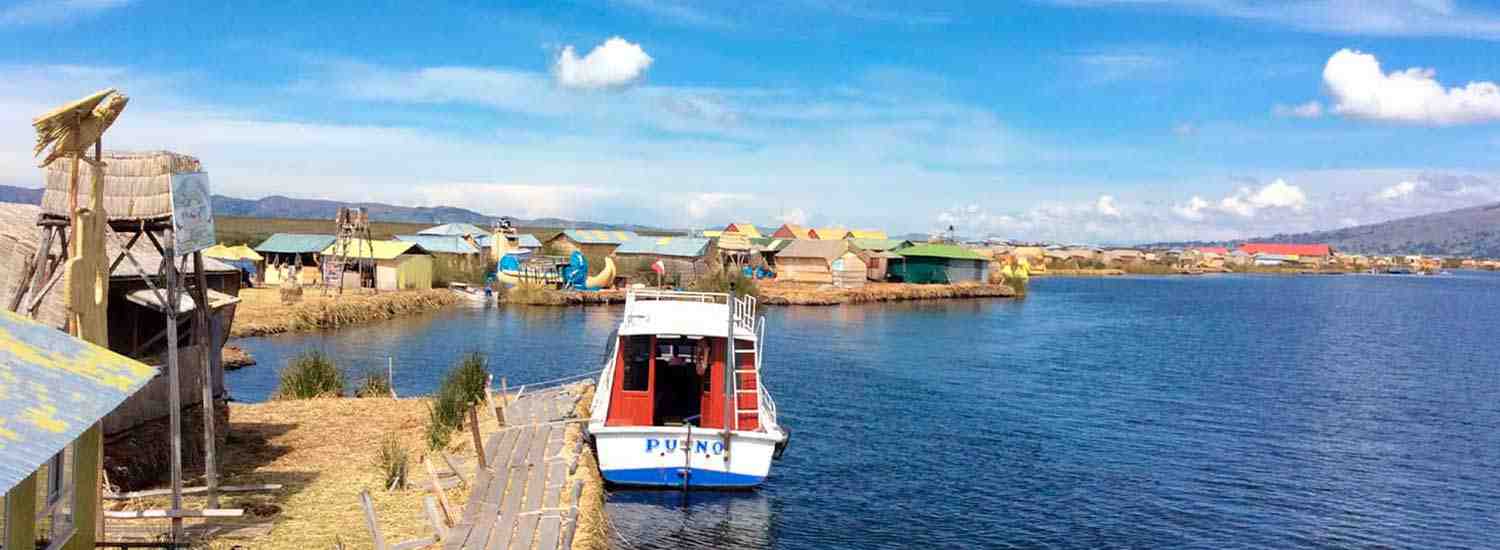 This picture is the famous lake Titicaca located in Peru, with the famous Uros island, where stay overnight the tourists